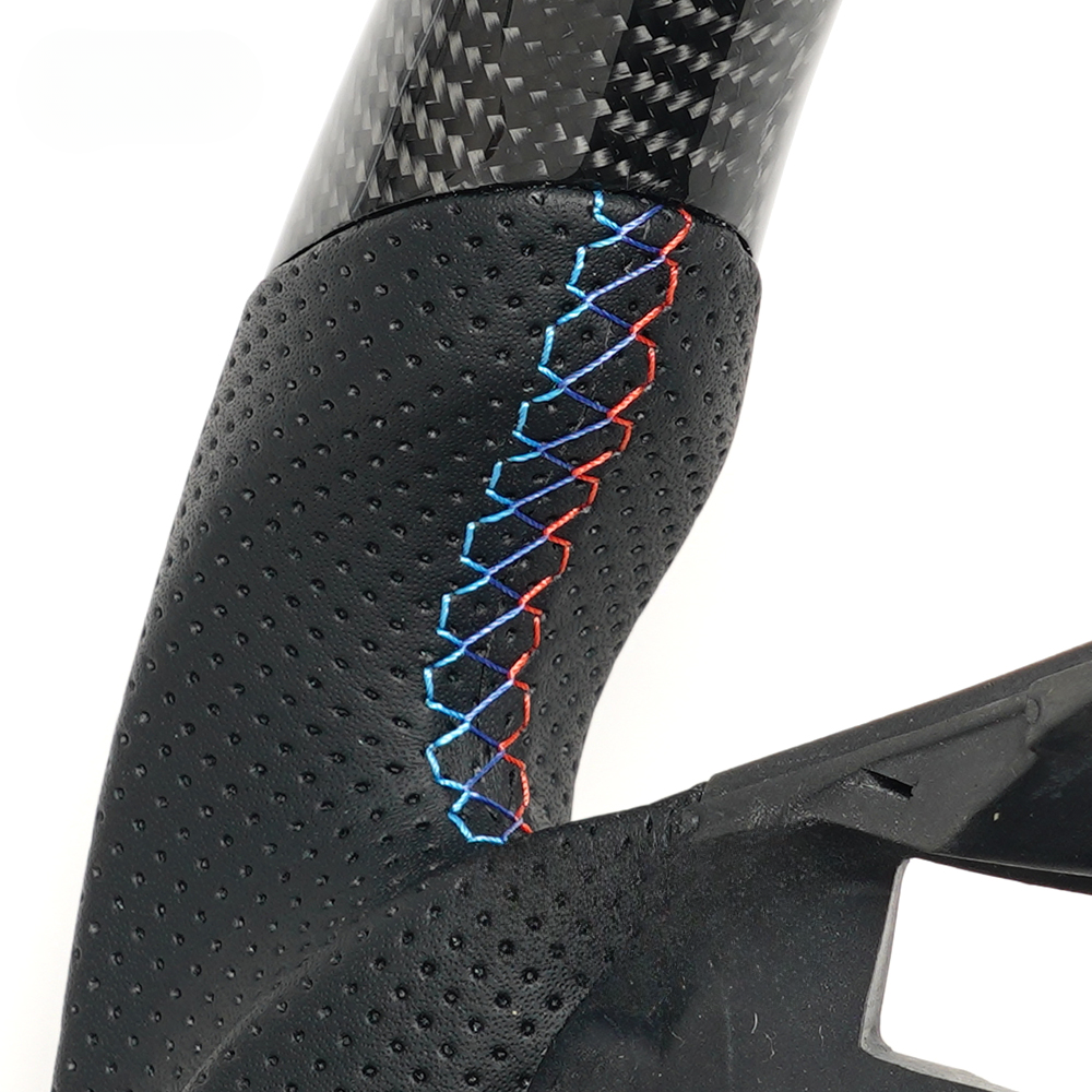 Vekto real carbon fiber steering wheel for BMW E90 E92 E93 M3 328i 335i 135i models, showing textured carbon fiber surface and ergonomic grip