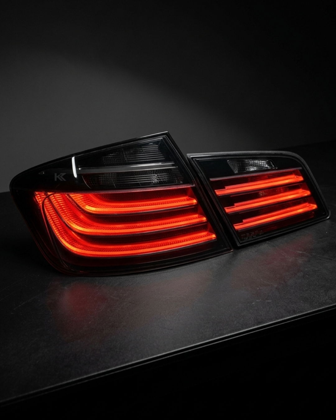 BMW 5 Series F10 BlackLine Style LED tail lights by K2 Industries, featuring sleek black housing and LED illumination.