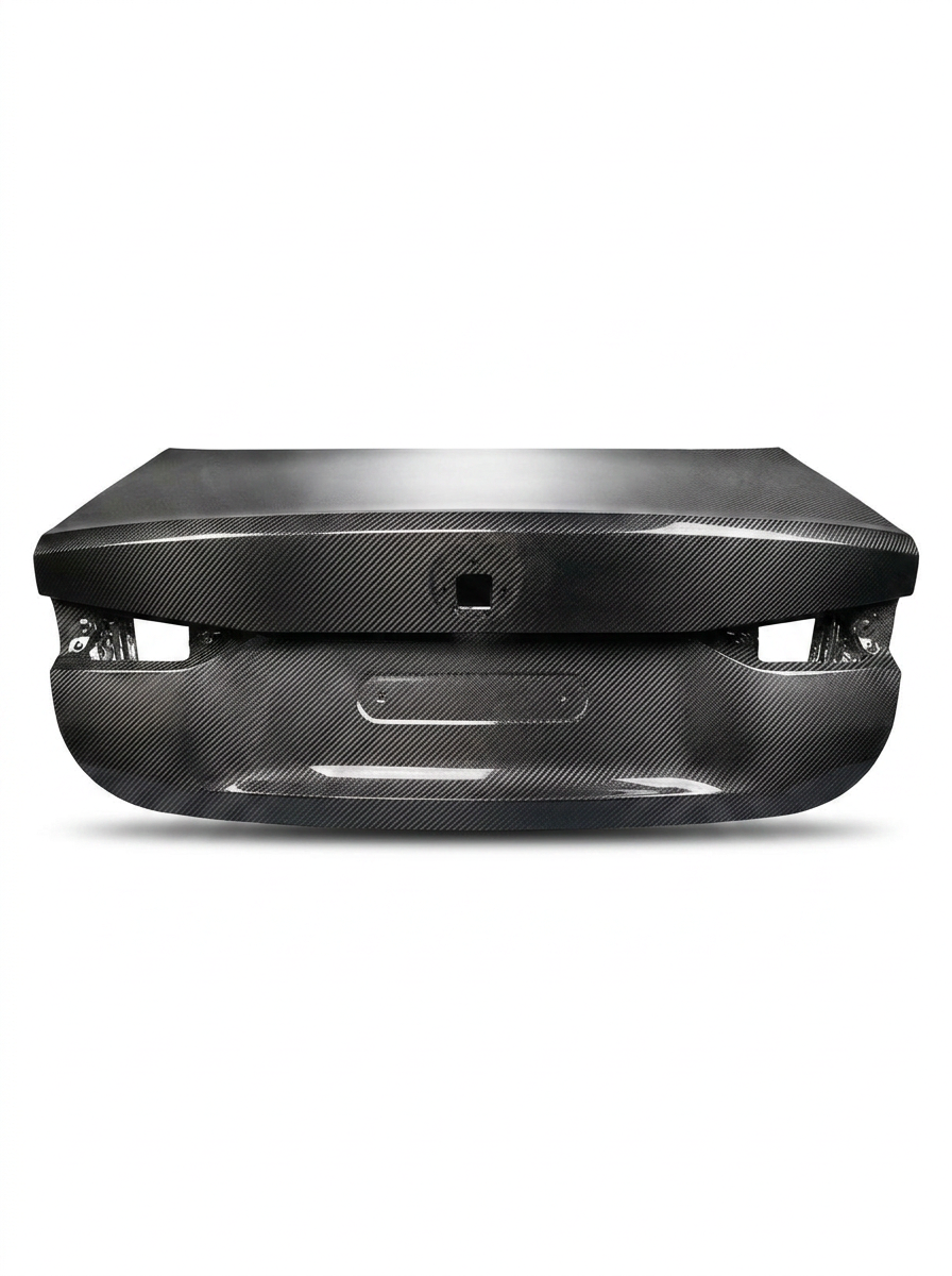 BMW 4 Series G82 M4 OEM style carbon fiber trunk by K2 Industries, lightweight and aerodynamic car trunk for 2021+ models.