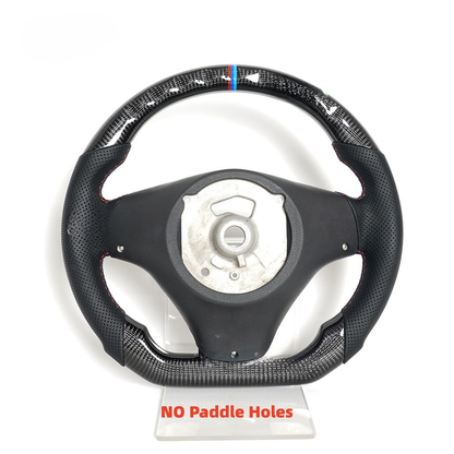 Vekto carbon fiber steering wheel for BMW E90/E92/E93 manual 2006-2013, close-up view of sleek, lightweight racing-style steering wheel