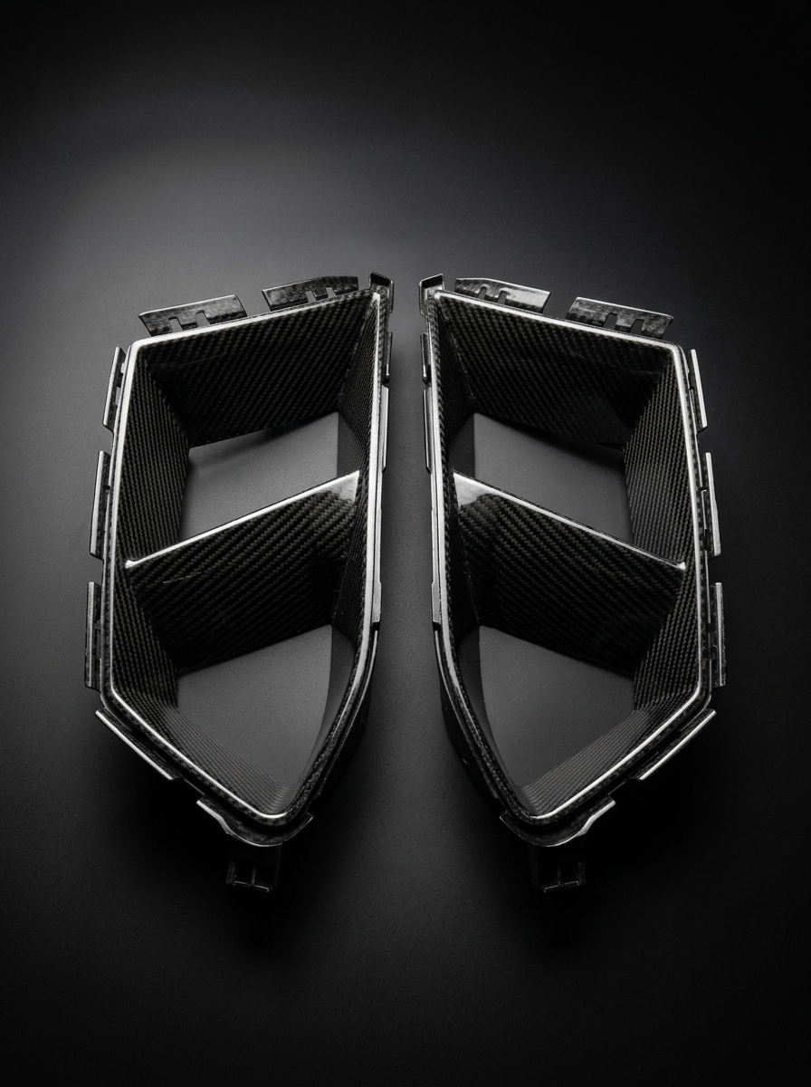 BMW 3/4 Series G80 G81 G82 G83 Carbon Fiber Air Ducts by K2 Industries, showing sleek, textured carbon fiber design for aerodynamic enhancement.