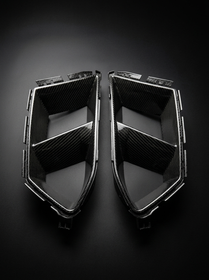 BMW 3/4 Series G80 G81 G82 G83 Carbon Fiber Air Ducts by K2 Industries, showing sleek, textured carbon fiber design for aerodynamic enhancement.