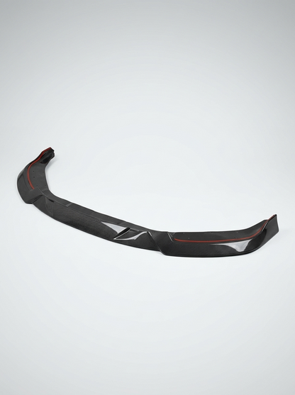 BMW 2 Series G87 M2 MHC Style carbon fiber front lip by K2 Industries, showcasing sleek aerodynamic design and textured finish.