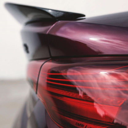 BMW 4 Series G22 G82 M4 PSM Style Carbon Fiber trunk spoiler by K2 Industries, showcasing sleek carbon fiber design on the car.