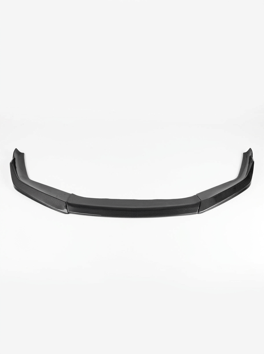 BMW 5 Series F90 M5 LCI CS Style carbon fiber front lip by K2 Industries, showcasing sleek, aerodynamic design on the vehicle's front bumper.