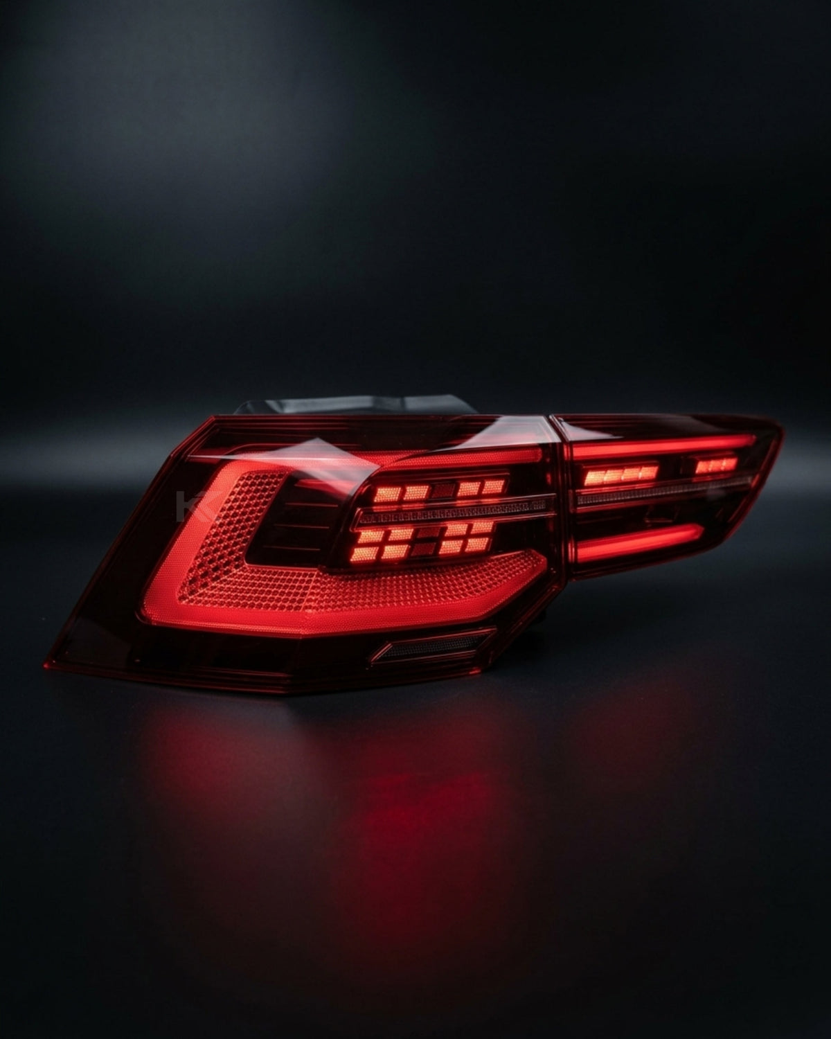 Volkswagen Golf 8 LED tail lights by K2 Industries, European style, showing sleek design and illuminated light strips on the car's rear.