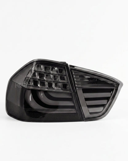 BMW 3-Series E90 tail light upgrade by K2 Industries, showing sleek red and clear tail lights for 2006-2009 models.