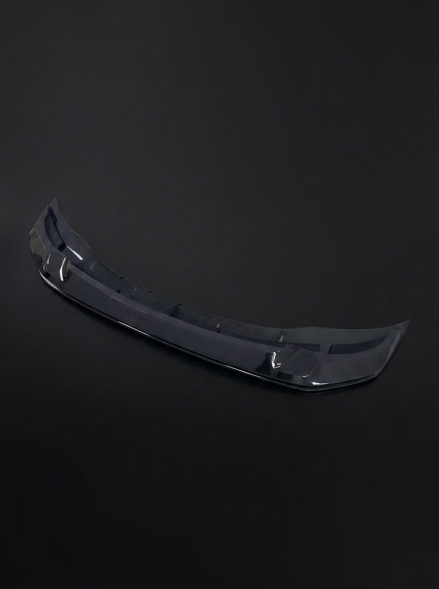 K2 Industries BMW 3 Series F80 M3 F82 F83 M4 GTS style carbon fiber front lip on car's front bumper, showcasing sleek, lightweight design.