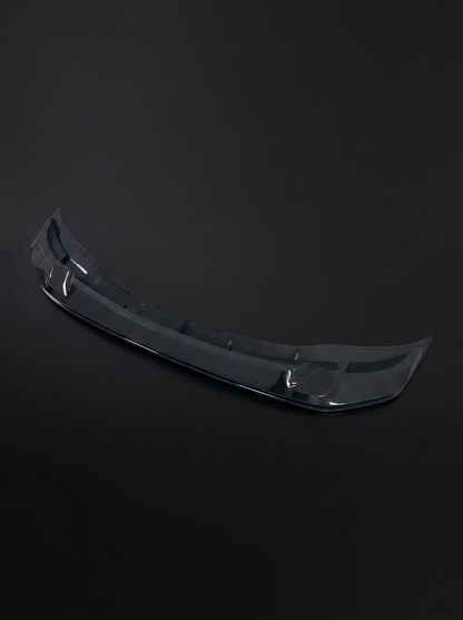 K2 Industries BMW 3 Series F80 M3 F82 F83 M4 GTS style carbon fiber front lip on car's front bumper, showcasing sleek, lightweight design.