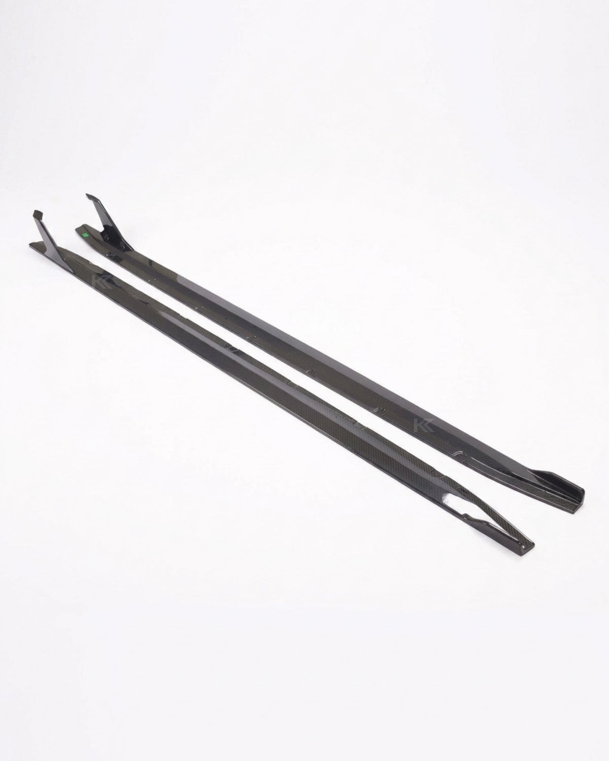 BMW M4 G82 G83 side skirt extensions made of pre-preg dry carbon fiber, featuring sleek, aerodynamic design by K2 Industries.