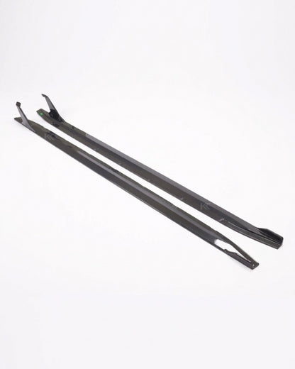 BMW M4 G82 G83 side skirt extensions made of pre-preg dry carbon fiber, featuring sleek, aerodynamic design by K2 Industries.