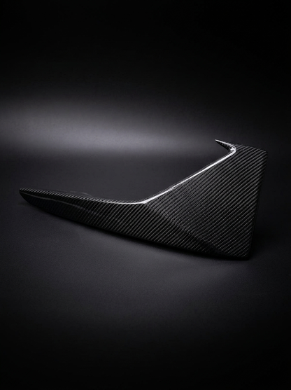 BMW 2 Series M2 F87 carbon fiber front flaps by K2 Industries, showing sleek, lightweight aerodynamic accessories on the vehicle.