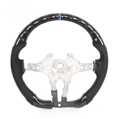 Vekto real carbon fiber M Sport steering wheel for BMW F-Series, X1, X2, X3, X4, X5, and X6 models, close-up view of the steering wheel.