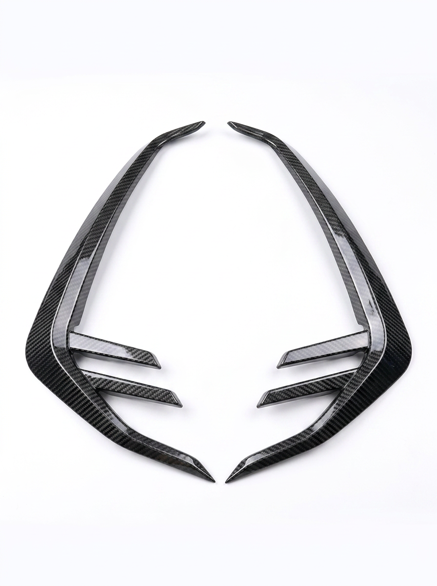 BMW 3/4 Series G80/G81/G82/G83 dry carbon fiber fender vents by K2 Industries, showcasing sleek, textured carbon fiber design.