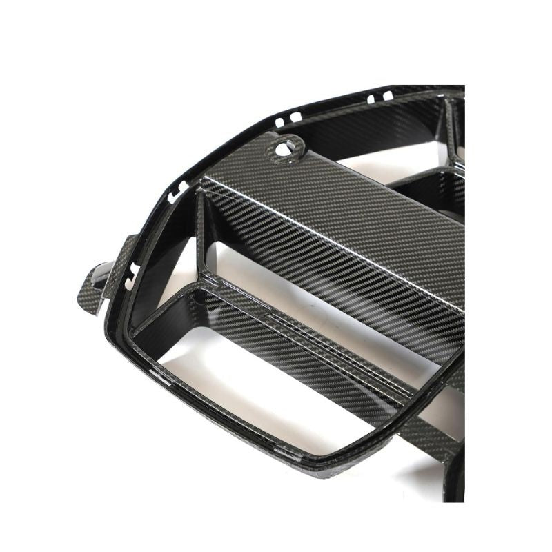 Carbon fiber kidney grille for BMW G80 M3 and G82/G83 M4, designed by Palenon Performance with a sleek, lightweight finish.