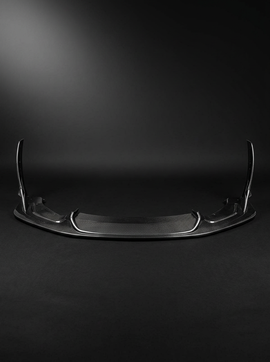 BMW 3 Series F80 M3 F82 F83 M4 Laptor Style carbon fiber front lip by K2 Industries, shown on the vehicle front bumper.