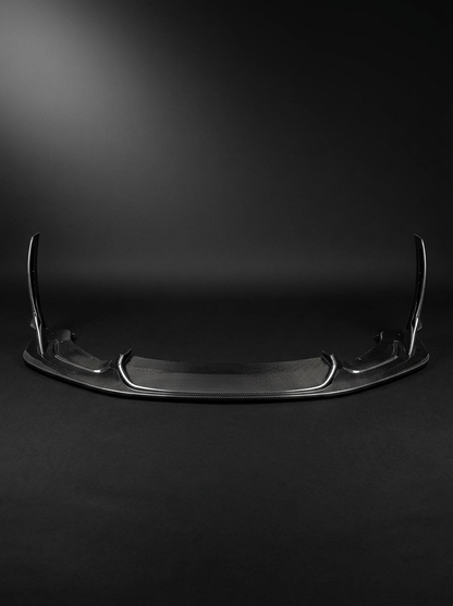 BMW 3 Series F80 M3 F82 F83 M4 Laptor Style carbon fiber front lip by K2 Industries, shown on the vehicle front bumper.