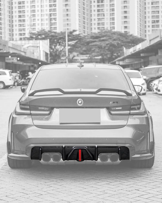 BMW 3 Series G80 M3 G82 G83 M4 carbon fiber rear diffuser with integrated LED lights by K2 Industries, designed for 2019-2024 models.