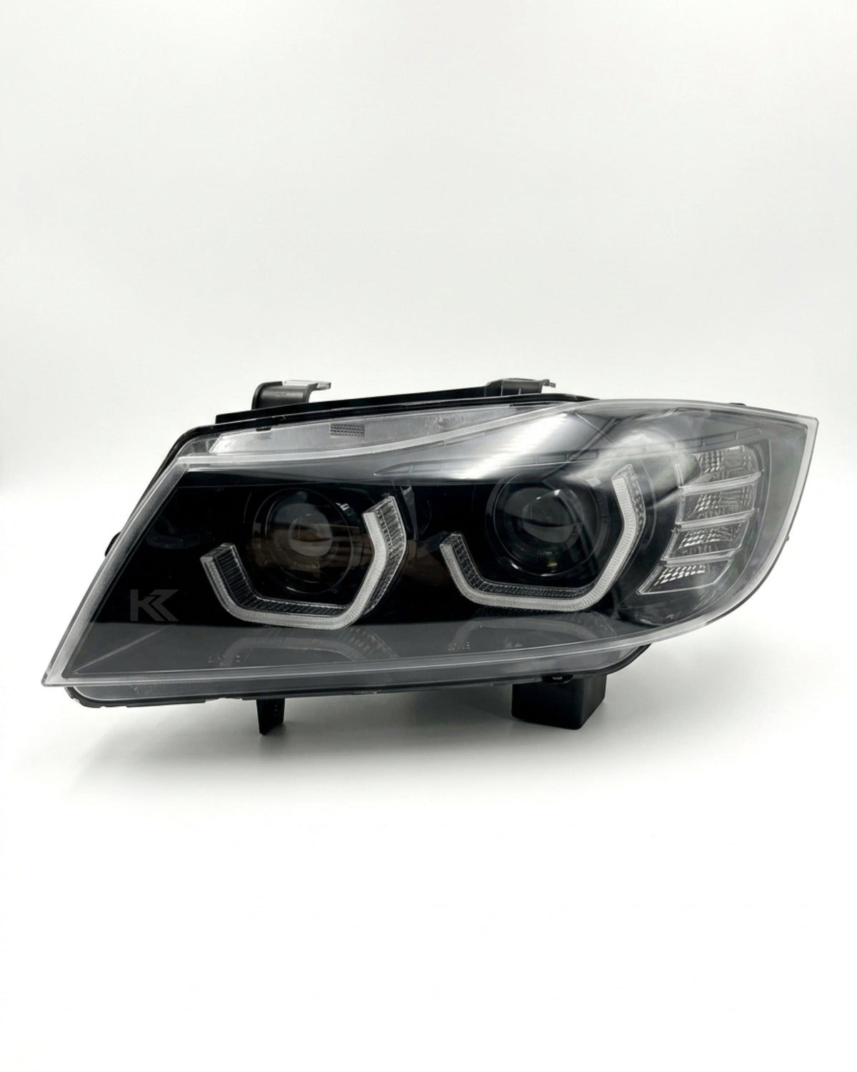 K2 Industries BMW 3-Series E90/E91 "TRON" headlights for 2005-2012, showing sleek design and clear lens details.