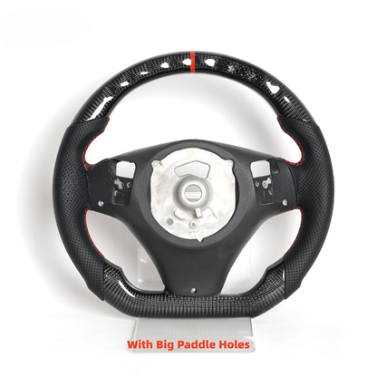 Vekto carbon fiber steering wheel for BMW E90 E91 E92 E93 models, showcasing sleek black carbon fiber surface and ergonomic design.