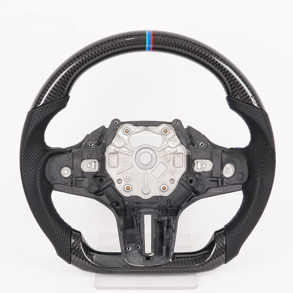 Vekto M Sport carbon fiber steering wheel for BMW G Series with sporty design and textured grip in close-up view
