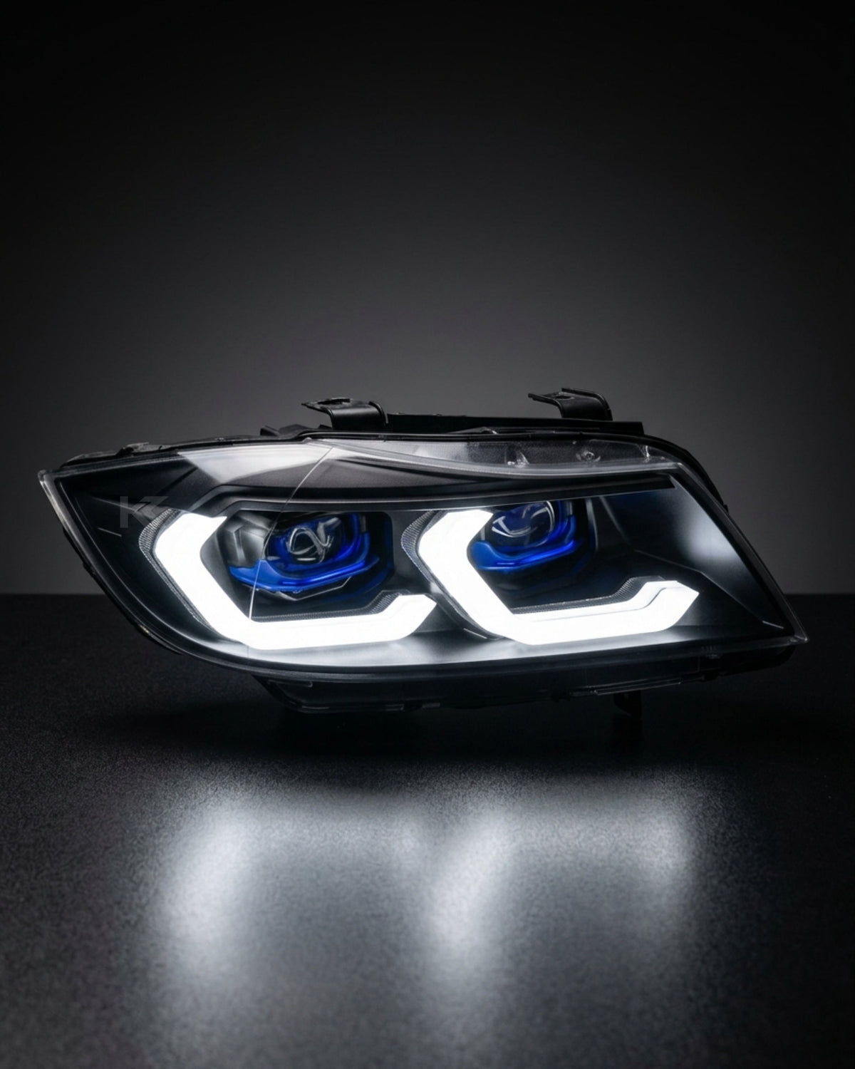 BMW 3 Series E90 LED headlight assembly with dual-color DRL by K2 Industries, showing the front view of the headlights.