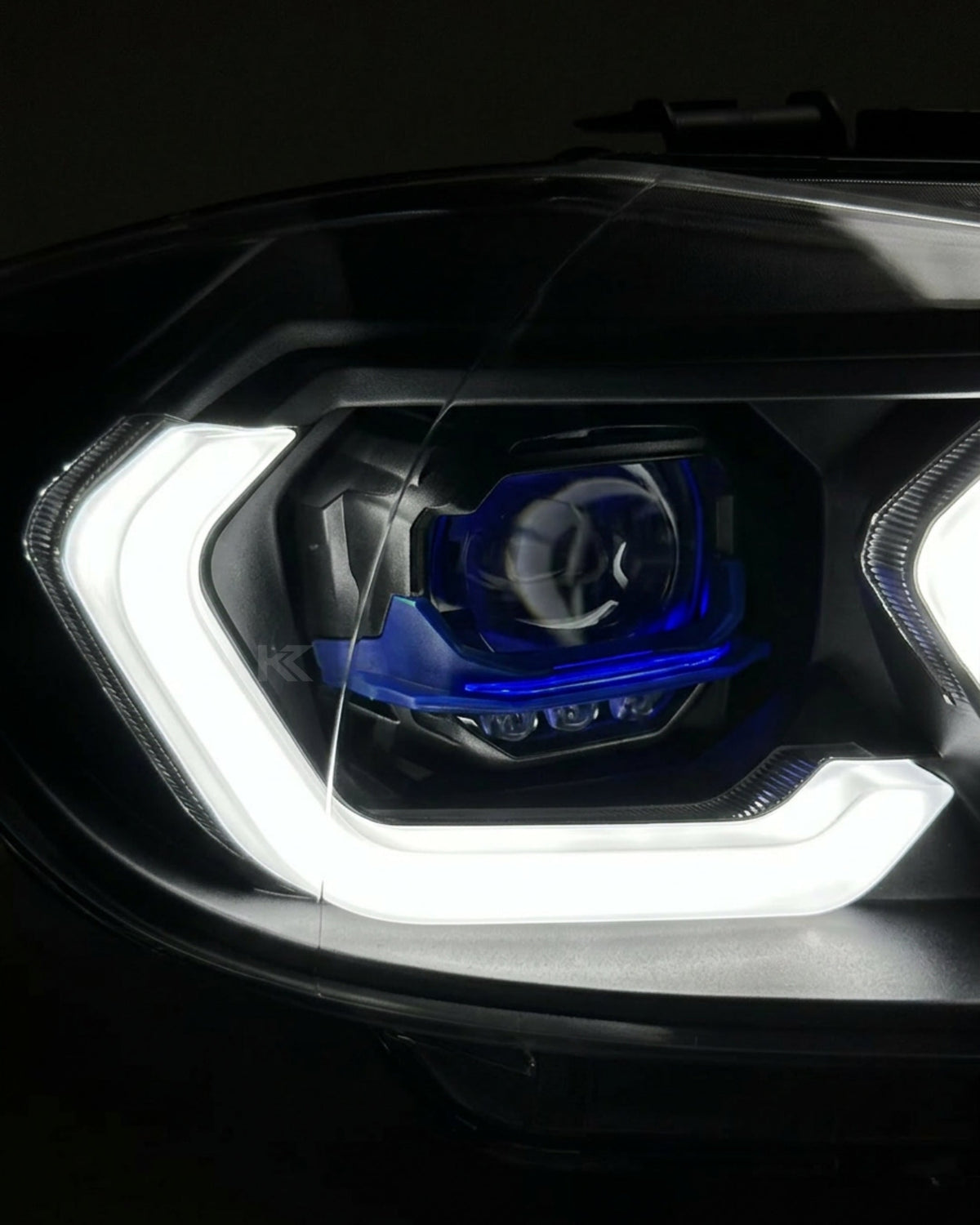 BMW 3 Series E90 LED headlight assembly with dual-color daytime running lights, made by K2 Industries, for 2005-2012 models
