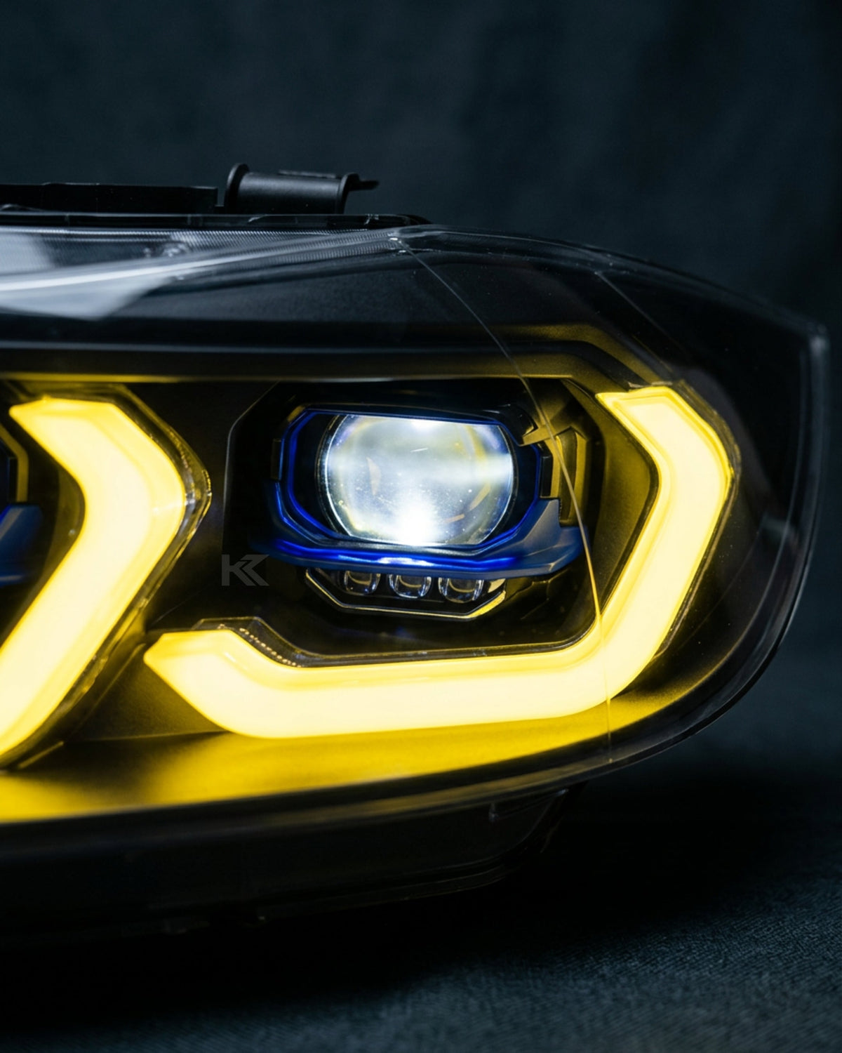 BMW 3 Series E90 LED headlight assembly with dual-color daytime running lights by K2 Industries, for 2005-2012 models.