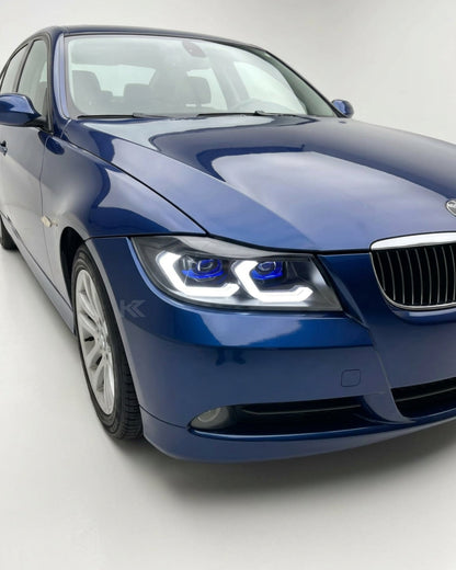 BMW 3 Series E90 LED headlight assembly with dual-color DRL by K2 Industries, showing the sleek headlight design and LED features.