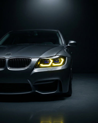 BMW 3 Series E90 LED headlight assembly with dual-color DRL by K2 Industries, showing the headlight with illuminated DRL and sleek design.