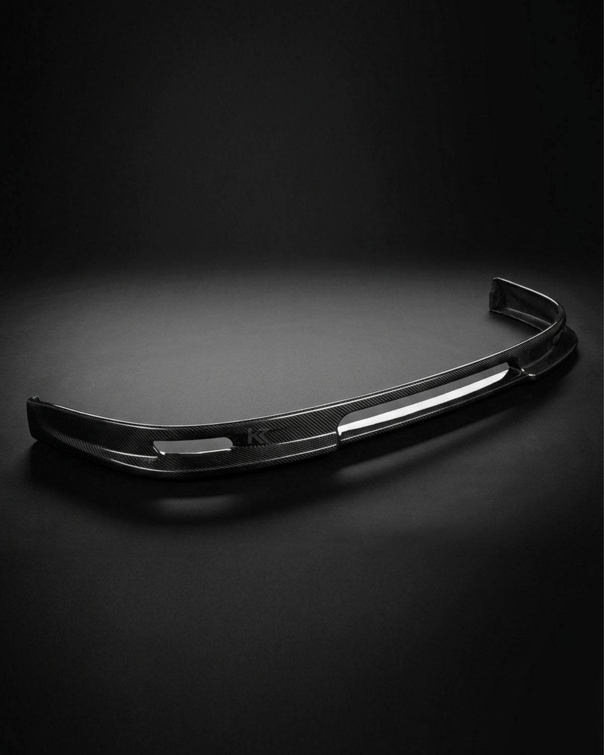 Volkswagen Golf GTI MK5 front bumper splitter in carbon fiber with A style design, made by K2 Industries.