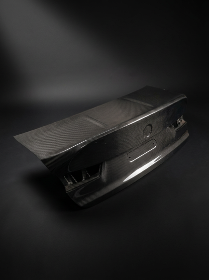 BMW 3 Series G80 M3 CSL style carbon fiber trunk by K2 Industries, featuring sleek black carbon fiber with aerodynamic design.