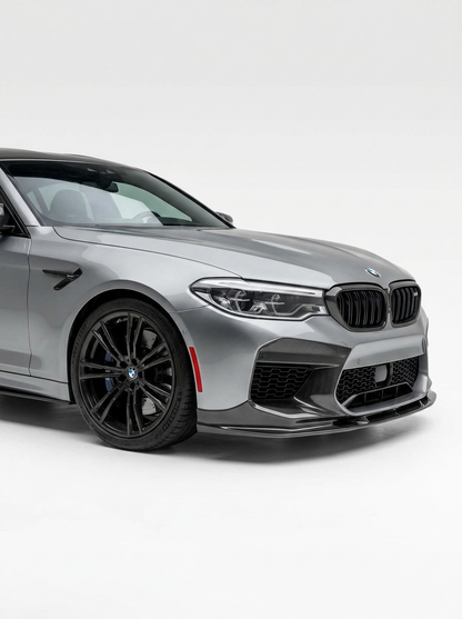 BMW 5 Series F90 M5 3D Style carbon fiber front lip by K2 Industries, showing the sleek, textured carbon fiber design on the car's front bumper.