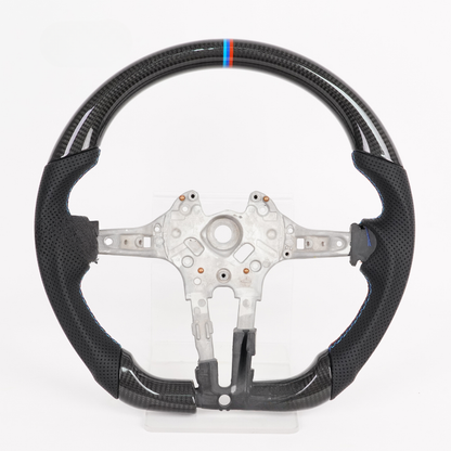 Vekto carbon fiber BMW F-Series steering wheel with tri-color or red stripe design, showcasing sleek, sporty interior style.