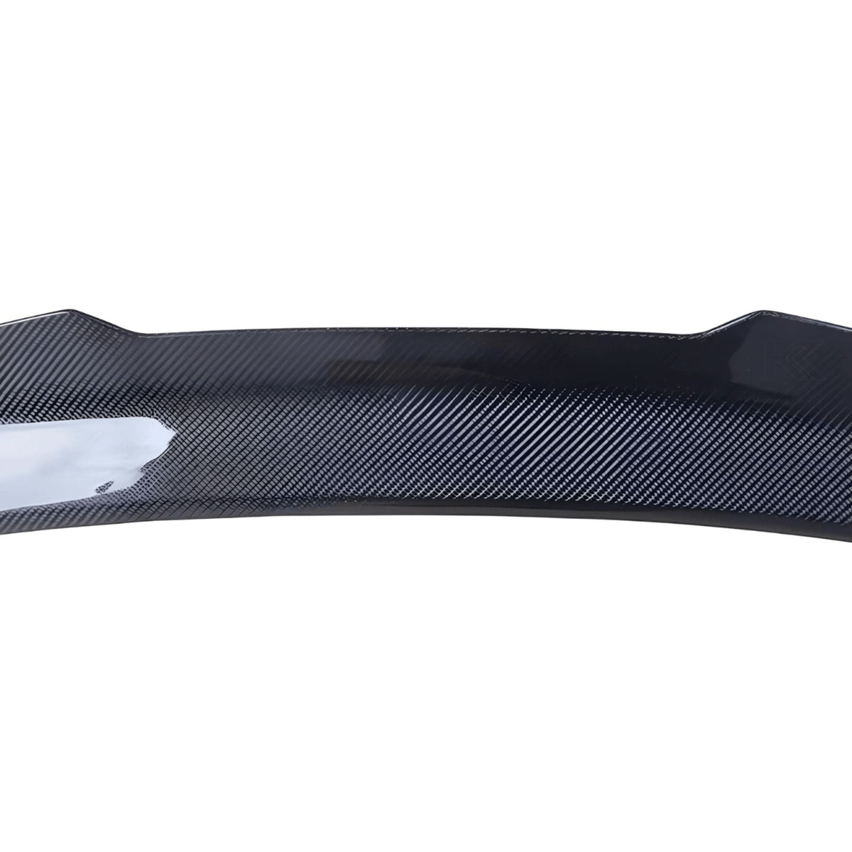 BMW 4 Series G22 G82 M4 carbon fiber trunk spoiler by K2 Industries, showcasing sleek, aerodynamic design on a modern sports car.