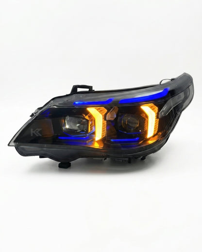 BMW 5 Series E60 Snake Eye LED headlight assembly with dual-color daytime running lights, black housing, for 2003-2010 vehicles.