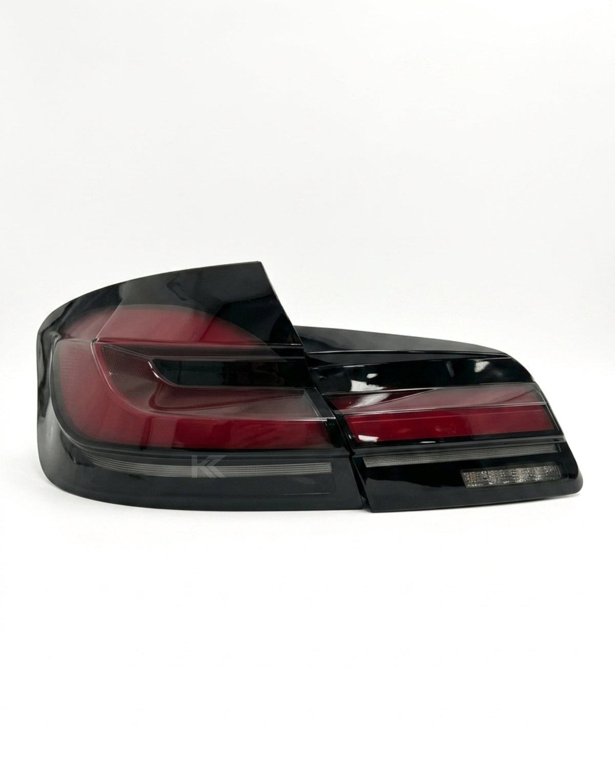 BMW 5-Series F10 F18 clear tail lights with G30 style from K2 Industries, showing the sleek, modern design for 2011-2017 models.