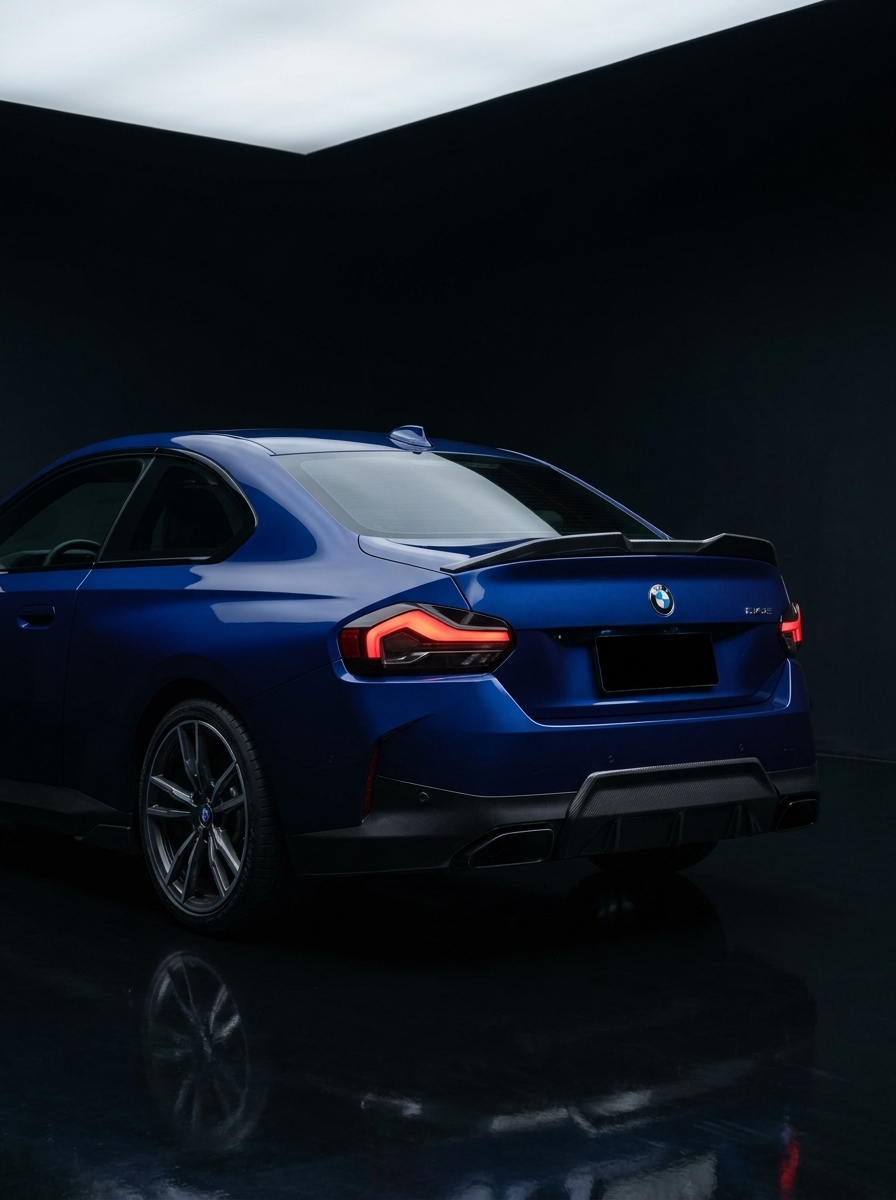 BMW 2 Series G42 MP Style carbon fiber spoiler by K2 Industries, showcasing sleek, aerodynamic design on a 2022+ model.