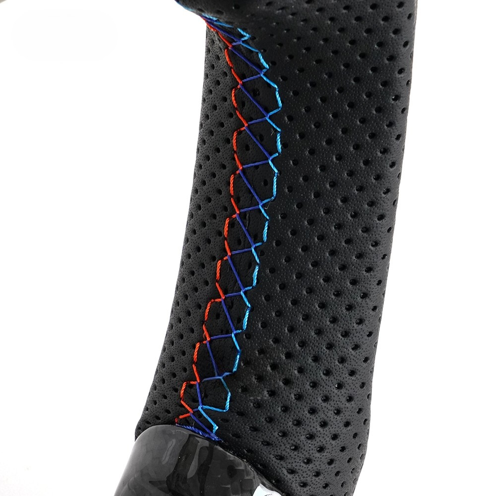 Vekto carbon fiber steering wheel for BMW F Series 2011+ interior, close-up view of the sleek, lightweight racing-style wheel.