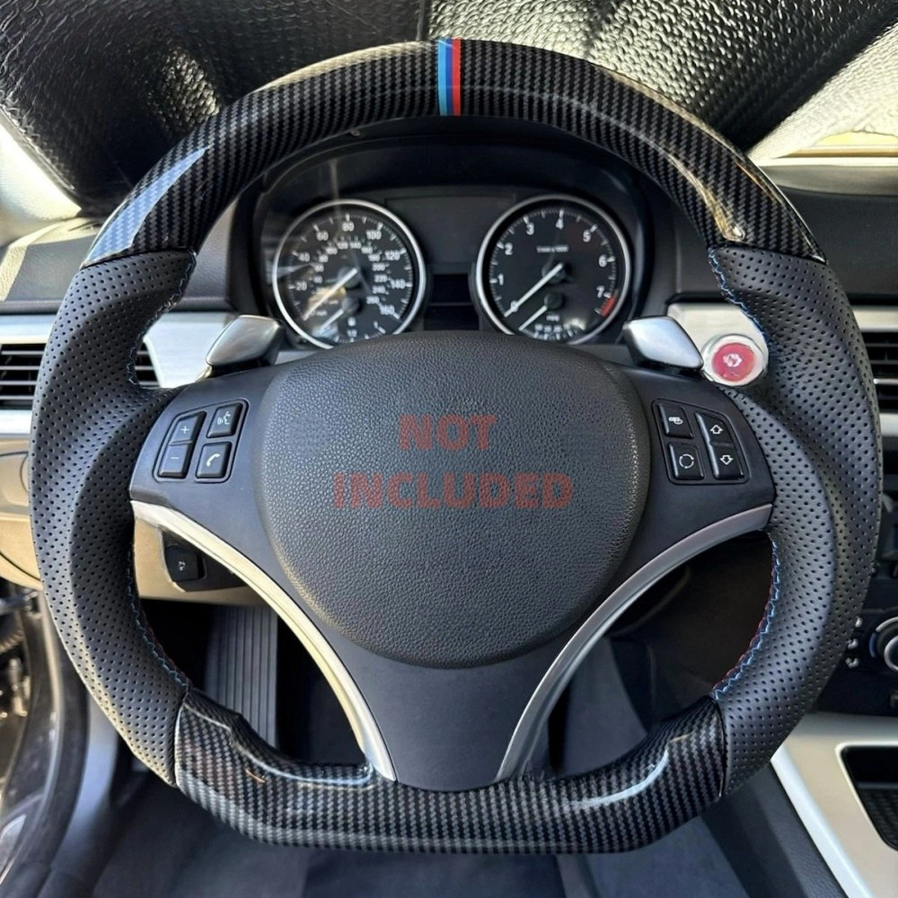 Hydro-Dip carbon steering wheel for BMW E90/E92/E93 M3 by Vekto, showing the textured black and carbon fiber finish.