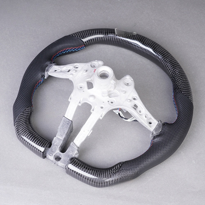 Vekto real carbon fiber LED steering wheel for BMW M3 F30 F80 F82 F87 F32 F36 series, non-heated, close-up view of the steering wheel.