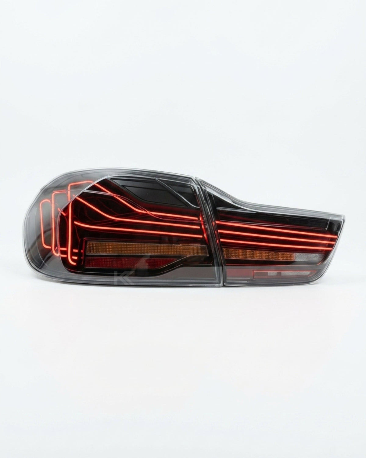 BMW 4-Series F32 F82 430i CSL Style LED tail lights by K2 Industries, installed on a 2013-2018 model.