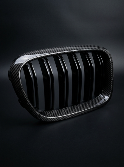 BMW 5 Series G30 carbon fiber front grille by K2 Industries, showcasing sleek black aerodynamic design and detailed weave pattern.