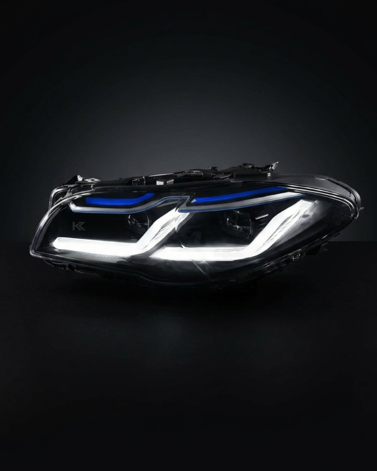 BMW 5-Series F10/F18 headlights with G30 style design by K2 Industries, showing the front view with clear lens and LED accents.