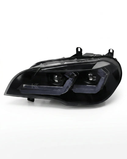 BMW X5 E70 LED headlights by K2 Industries, model "TRON," installed on 2007-2013 SUV, showing sleek headlight design and LED details.