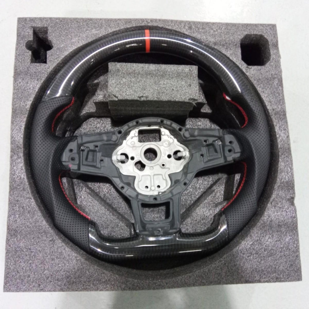 Vekto carbon fiber steering wheel for VW Golf 7 GTI R Mk7, close-up view showing textured black finish and ergonomic design