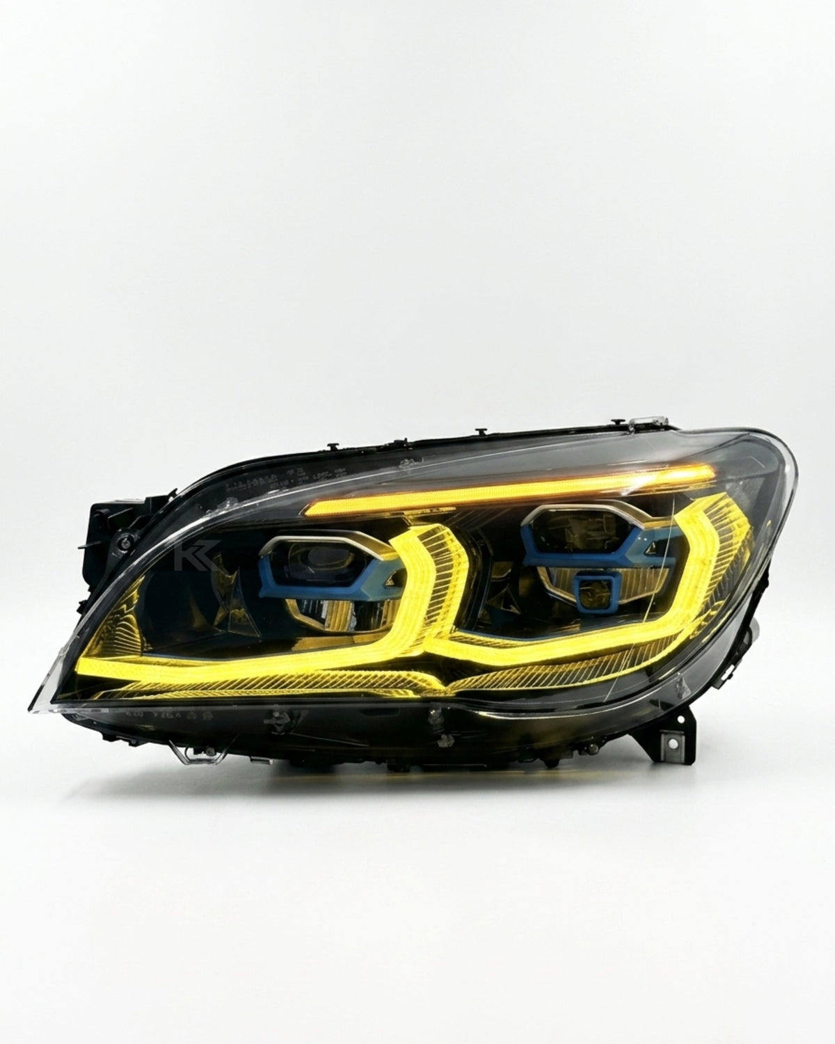 BMW 7 Series F02 G12 style LED headlight assembly with dual-color yellow and white DRL, for 2013-2015 models, by K2 Industries.