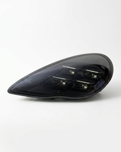 K2 Industries Porsche Panamera 970.1 LED headlight assembly with dual-color DRL, 2010-2013 model, showing the front view.