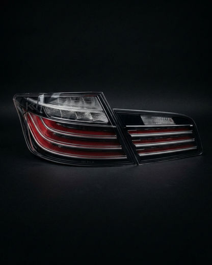 Black BMW 5 Series F10 LED tail lights from K2 Industries, stylish and modern rear lighting for 2011-2017 models.