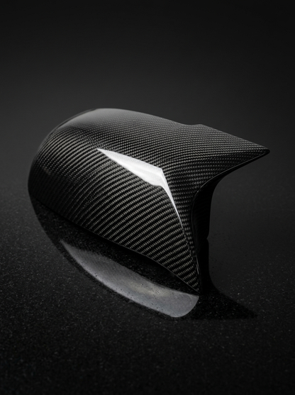 BMW 1 & 2 Series F20 F21 F22 F32 F87 M135i M140i carbon fiber side mirror covers by K2 Industries, showing sleek glossy finish